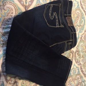 Woman’s silver jeans